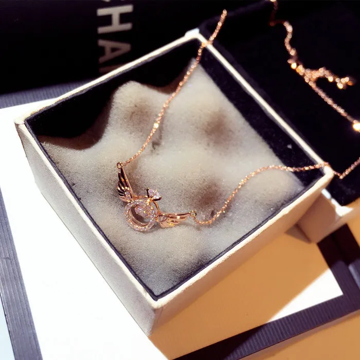 Angel Wing Halo Necklace – Gold & Diamond Elegance