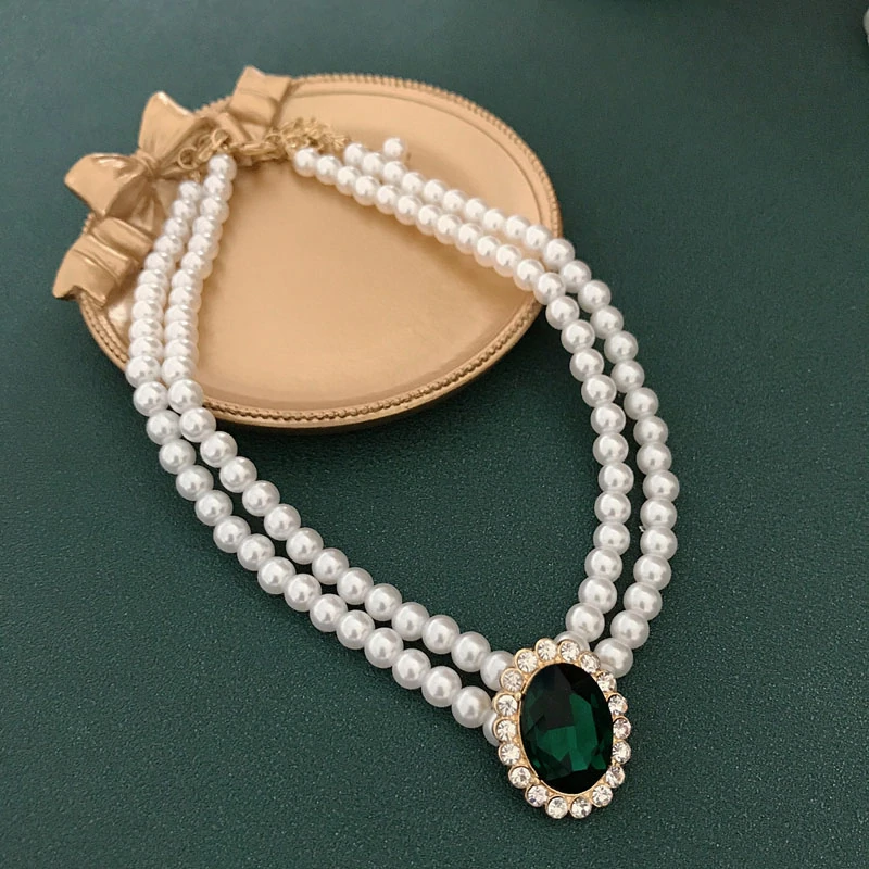 Regal Pearl Necklace – Double Strand with Emerald Halo Pendant